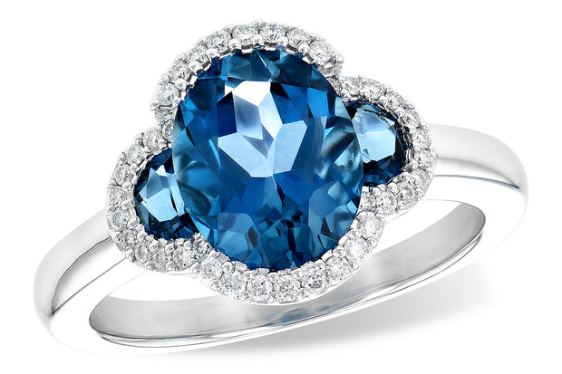 14k White Gold London Blue Topaz Three Stone Halo Ring by Allison Kaufman