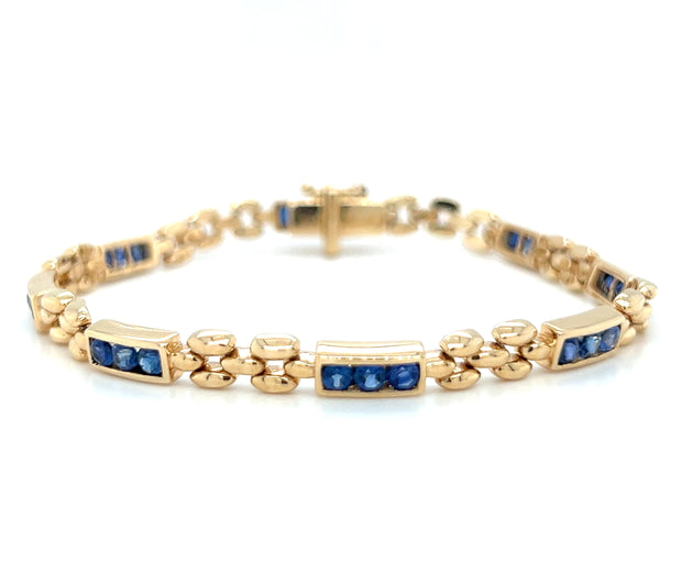 14k Yellow Gold Channel Set Blue Sapphire Panther Link Fashion Bracelet